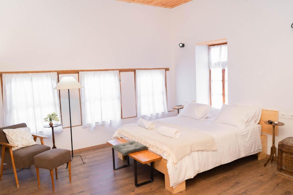 Postel nebo postele na pokoji v ubytování Belaj's House