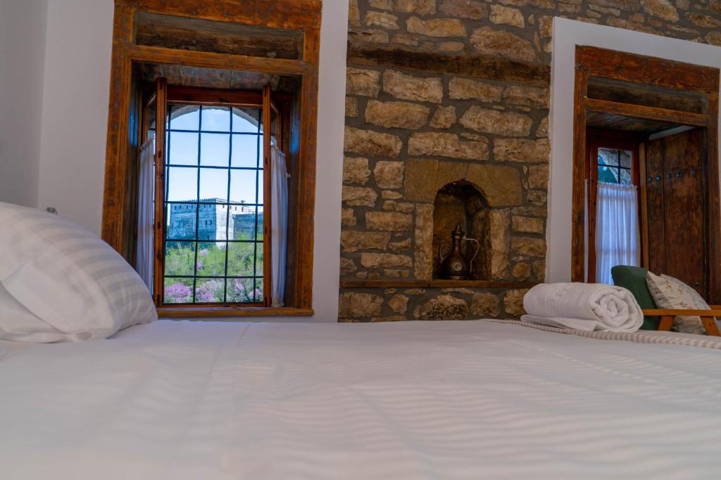 Postel nebo postele na pokoji v ubytování Belaj's House