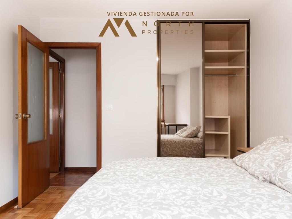 Postel nebo postele na pokoji v ubytování Fonte Camba 552 Apartament