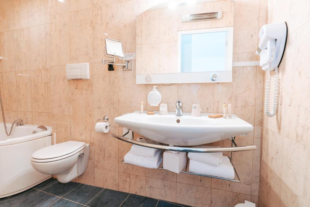 Koupelna v ubytování Hotel des Consuls