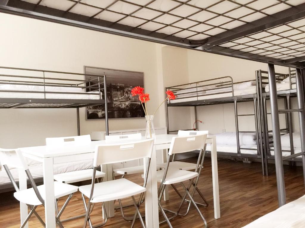 Postel nebo postele na pokoji v ubytování MAC City Hostel