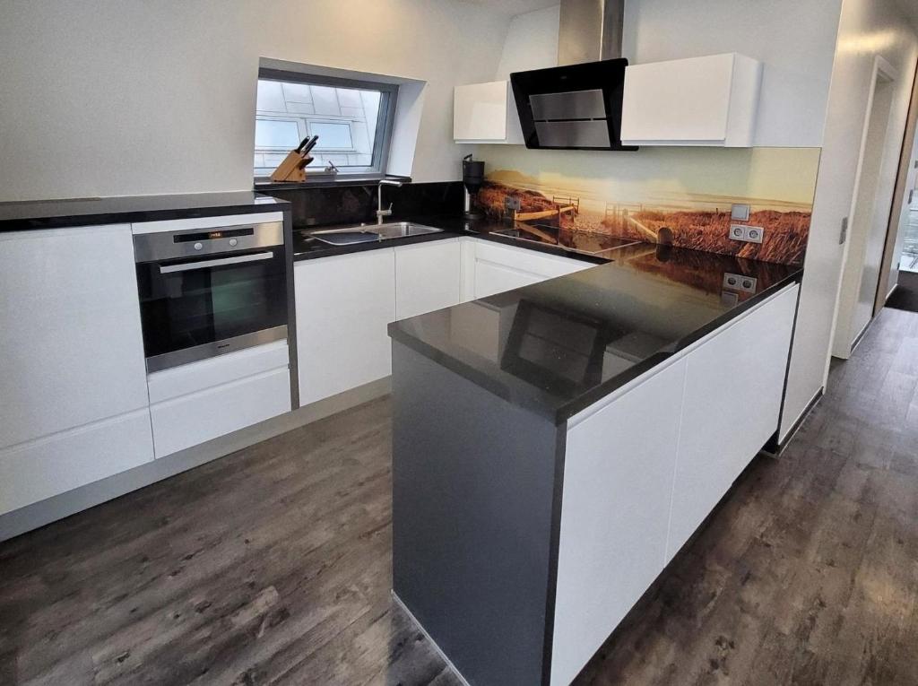 Η κουζίνα ή μικρή κουζίνα στο Ferienhaus Sky Grundbelegung 4 Pers