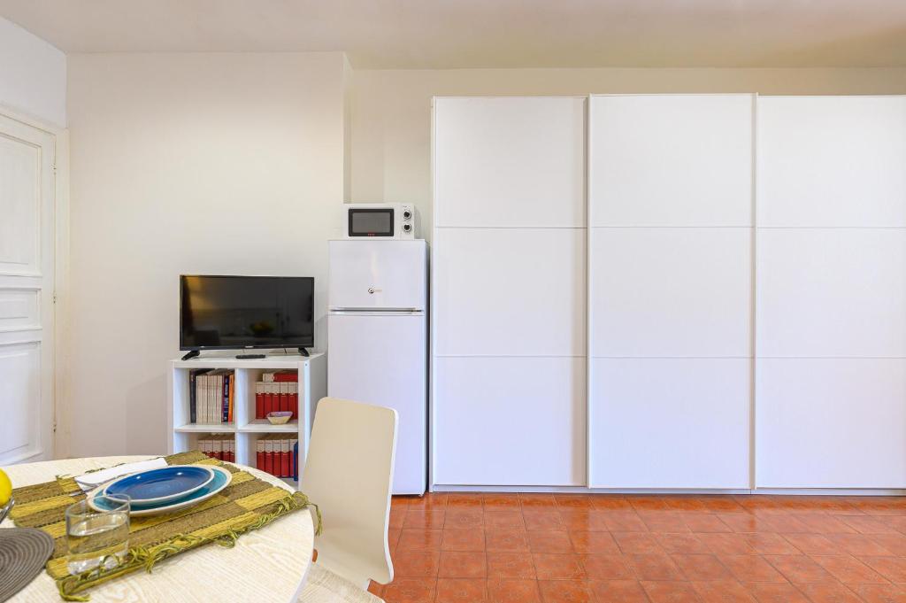 A kitchen or kitchenette at ROMA - Bel Poggio Country House