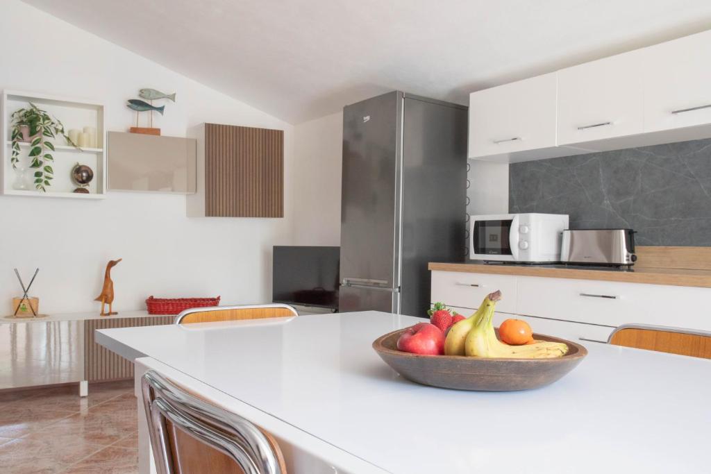 Kuchyň nebo kuchyňský kout v ubytování Silla House - A due passi dal lago