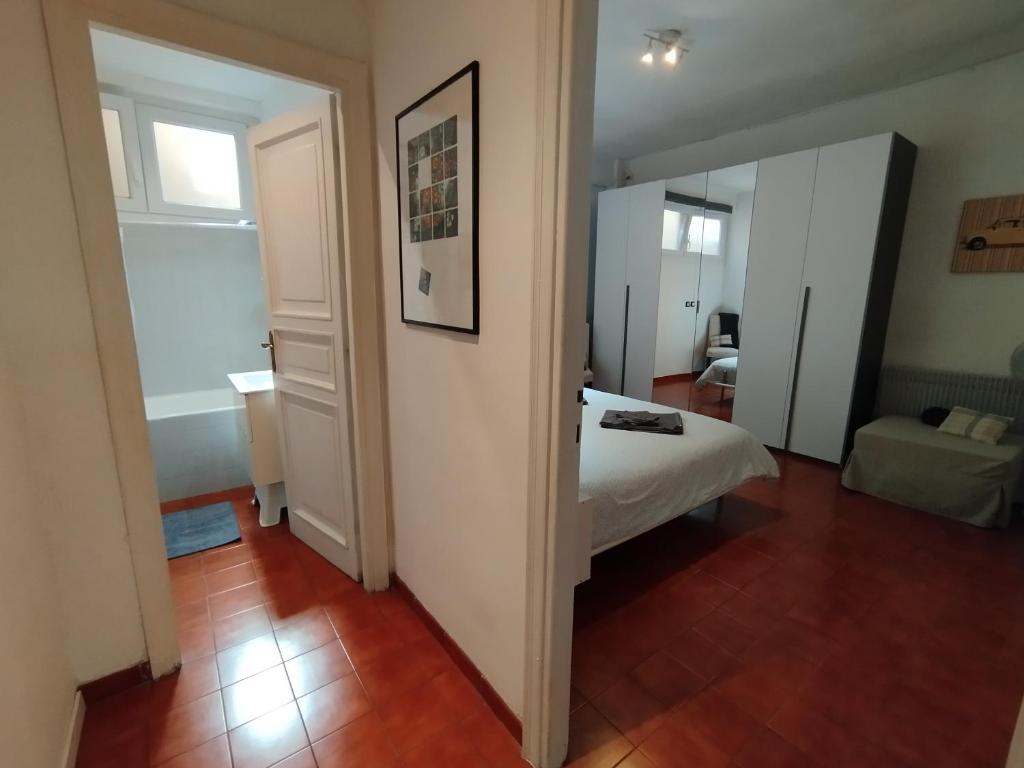 A bed or beds in a room at ROMA - Bel Poggio Country House