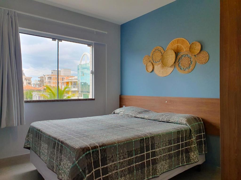 Cama ou camas em um quarto em Refugio dos Guaias