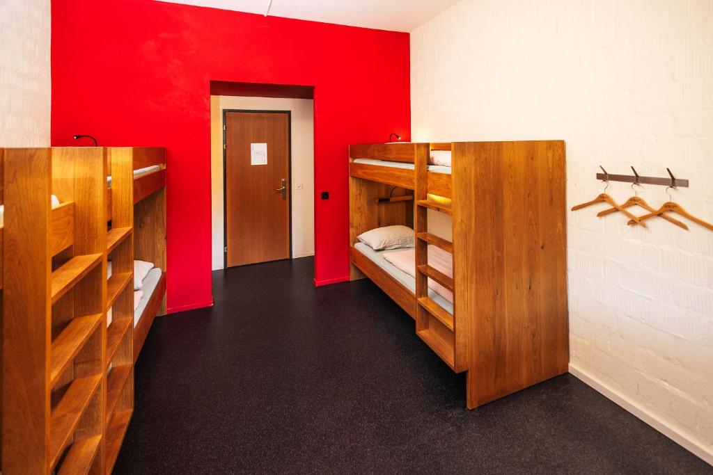 Postel nebo postele na pokoji v ubytování Baden Youth Hostel