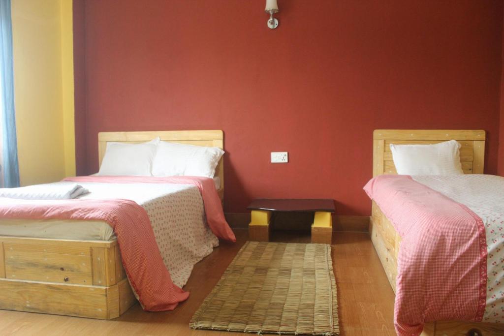 Postel nebo postele na pokoji v ubytování Hotel Holidays Inn - Bagpacker's Home