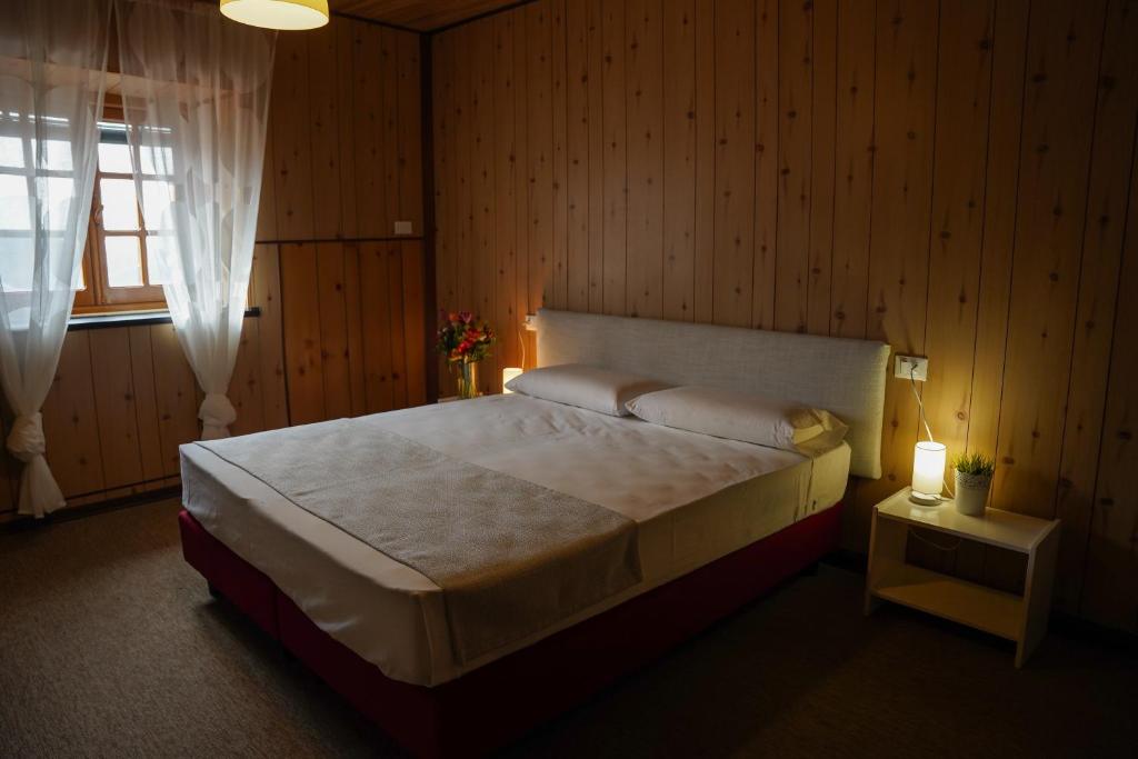 Postel nebo postele na pokoji v ubytování Casa Vicino