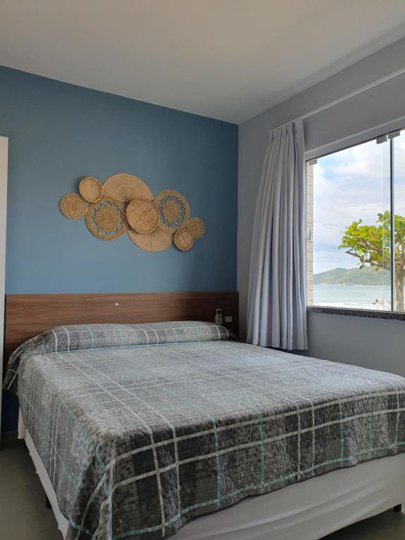 Cama ou camas em um quarto em Refugio dos Guaias