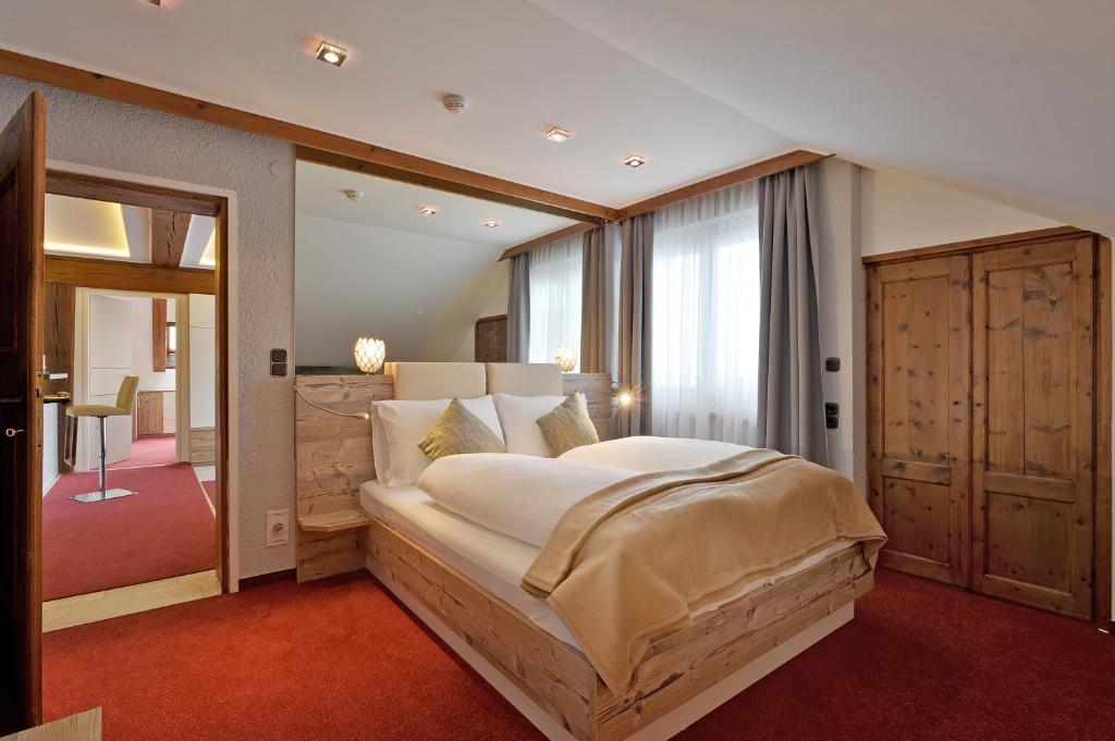 Posteľ alebo postele v izbe v ubytovaní Hotel Kufsteinerhof