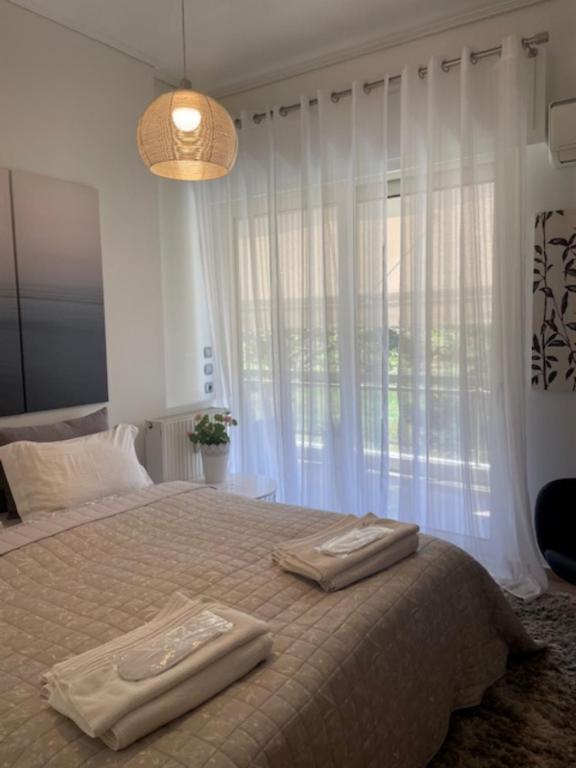 Posteľ alebo postele v izbe v ubytovaní Urban Residence