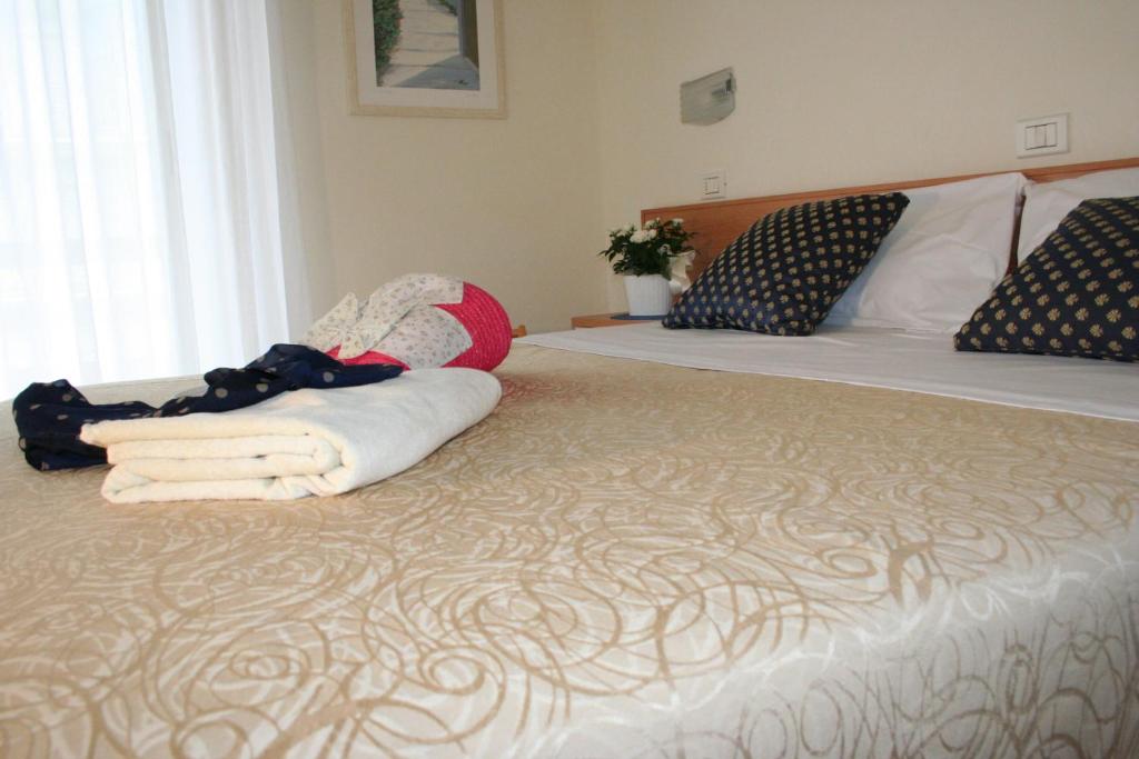 Postel nebo postele na pokoji v ubytování HOTEL HAWAY