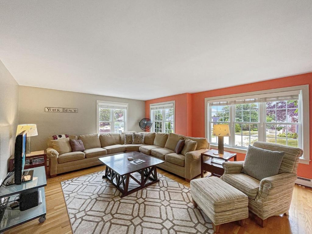 a living room with a couch and a table at Beach House Brought to you by GetAway Vacations in York