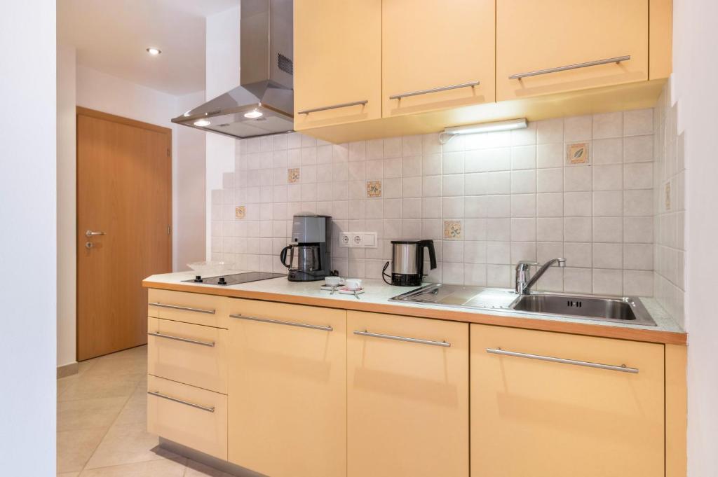 Kuchyň nebo kuchyňský kout v ubytování Haus Rosengarten Apt A