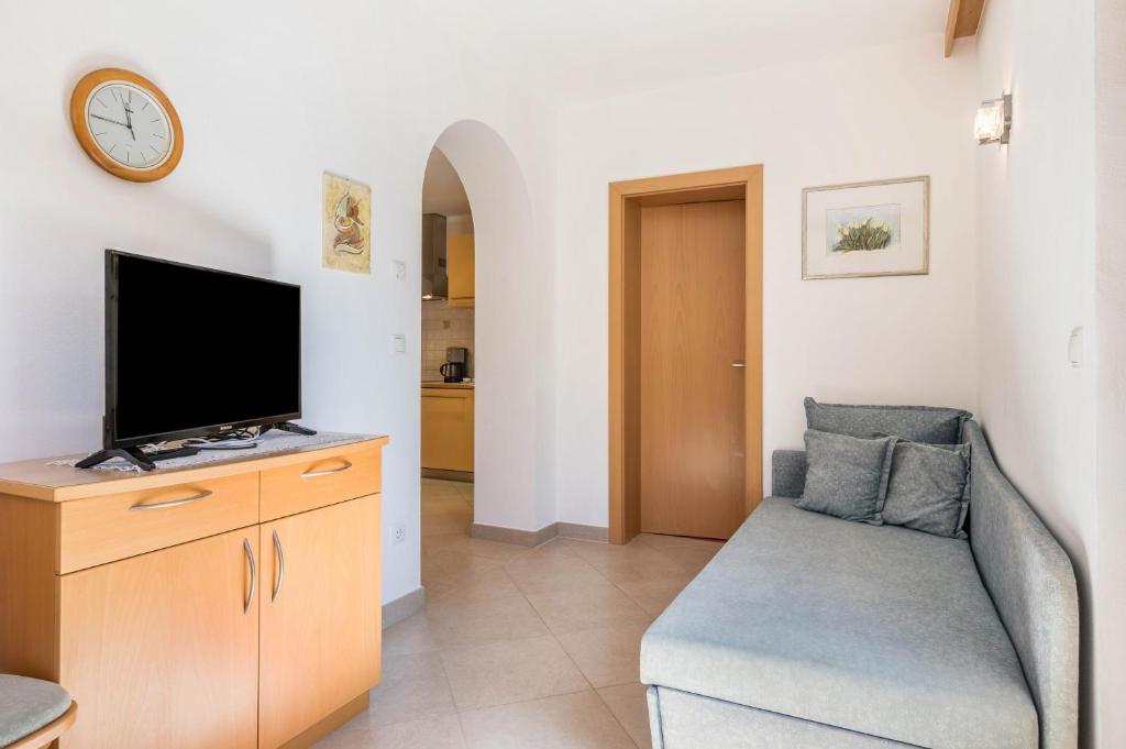 TV a/nebo společenská místnost v ubytování Haus Rosengarten Apt A