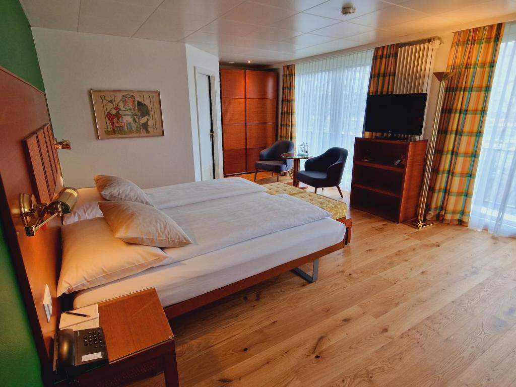 Postel nebo postele na pokoji v ubytování Engimatt City & Garden Hotel