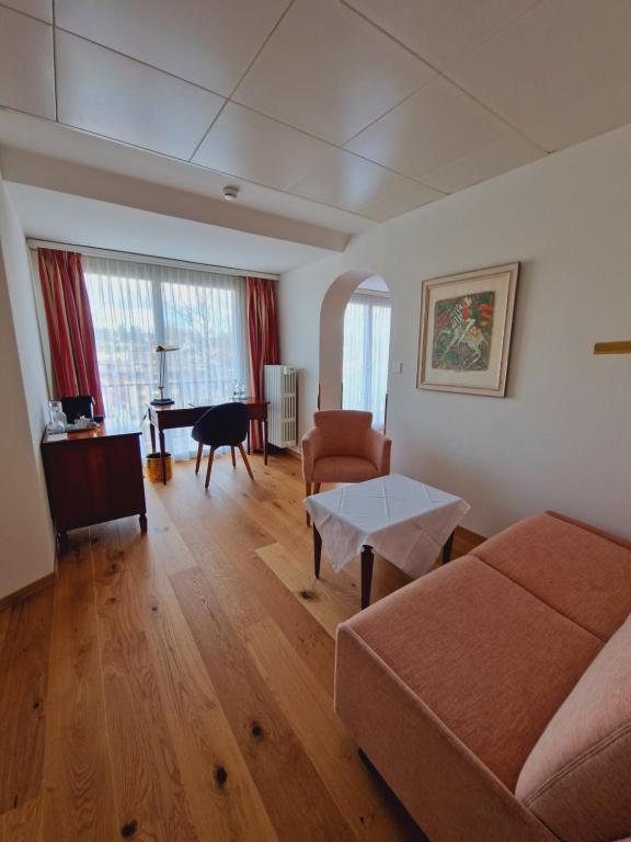 Postel nebo postele na pokoji v ubytování Engimatt City & Garden Hotel