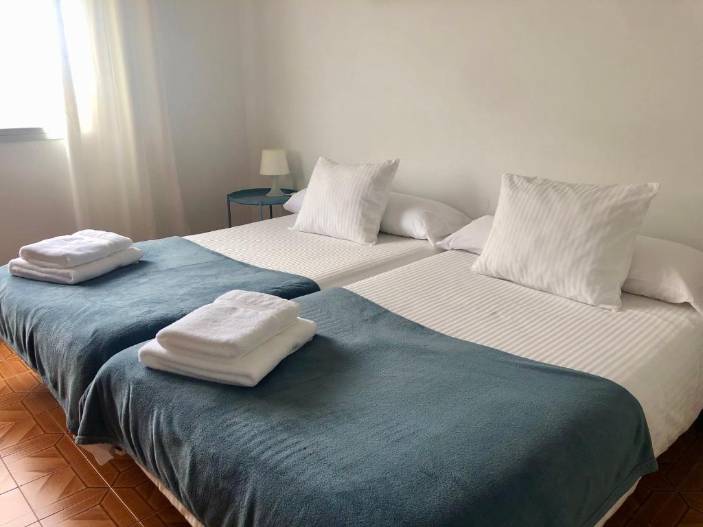 Postel nebo postele na pokoji v ubytování Vivienda de Uso Turístico Cariño