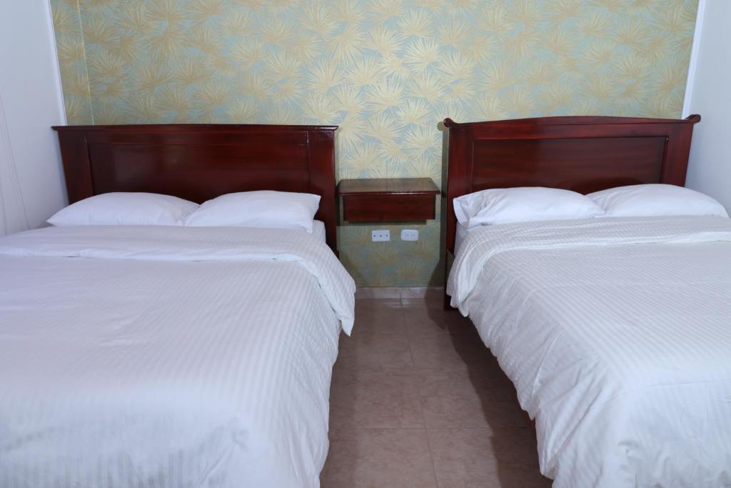 Postel nebo postele na pokoji v ubytování ROCCA VENTO