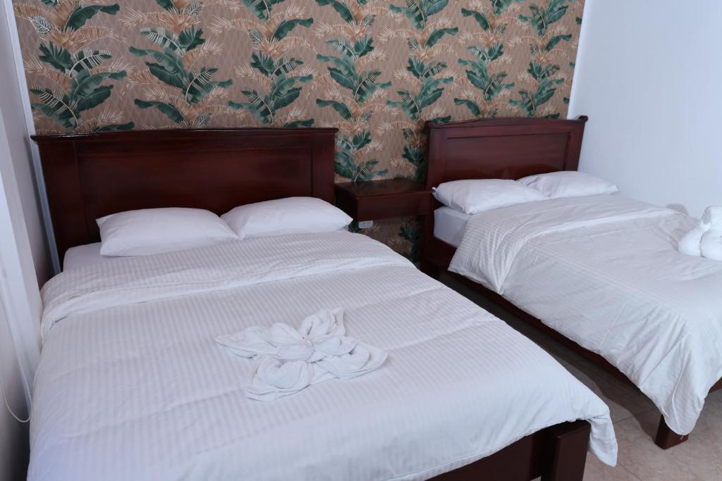 Postel nebo postele na pokoji v ubytování ROCCA VENTO