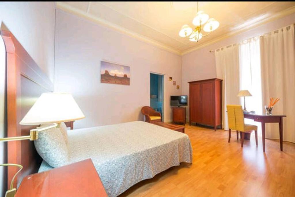 Postel nebo postele na pokoji v ubytování Bed & Breakfast Macallè