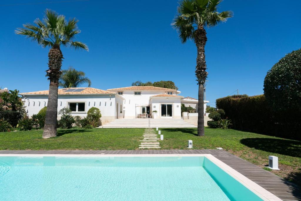 Πισίνα στο ή κοντά στο Villa Elena by Ortigia Apartments