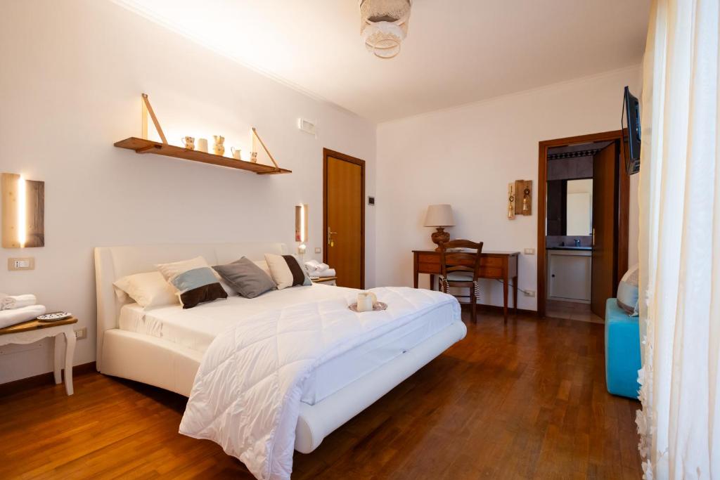 Postel nebo postele na pokoji v ubytování B&B CASA GAGLIARDI