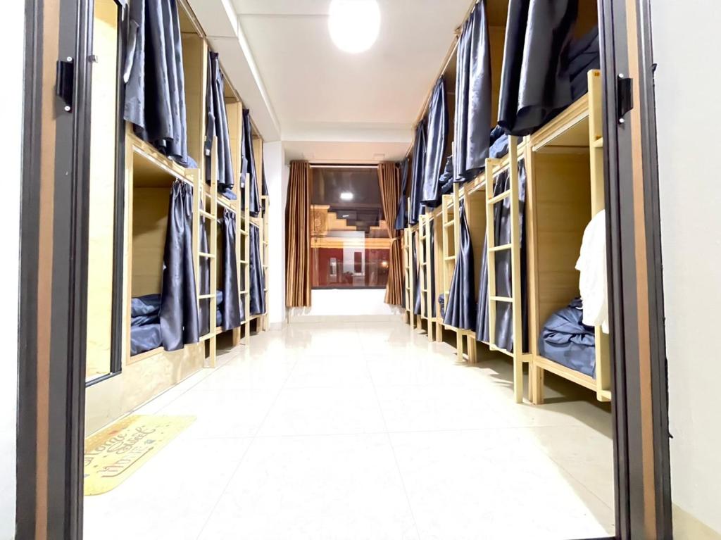 Postel nebo postele na pokoji v ubytování Nhật's Sapa Central Hostel
