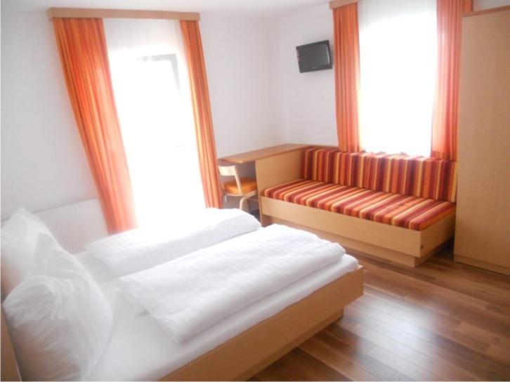 Postel nebo postele na pokoji v ubytování Haus Annemarie