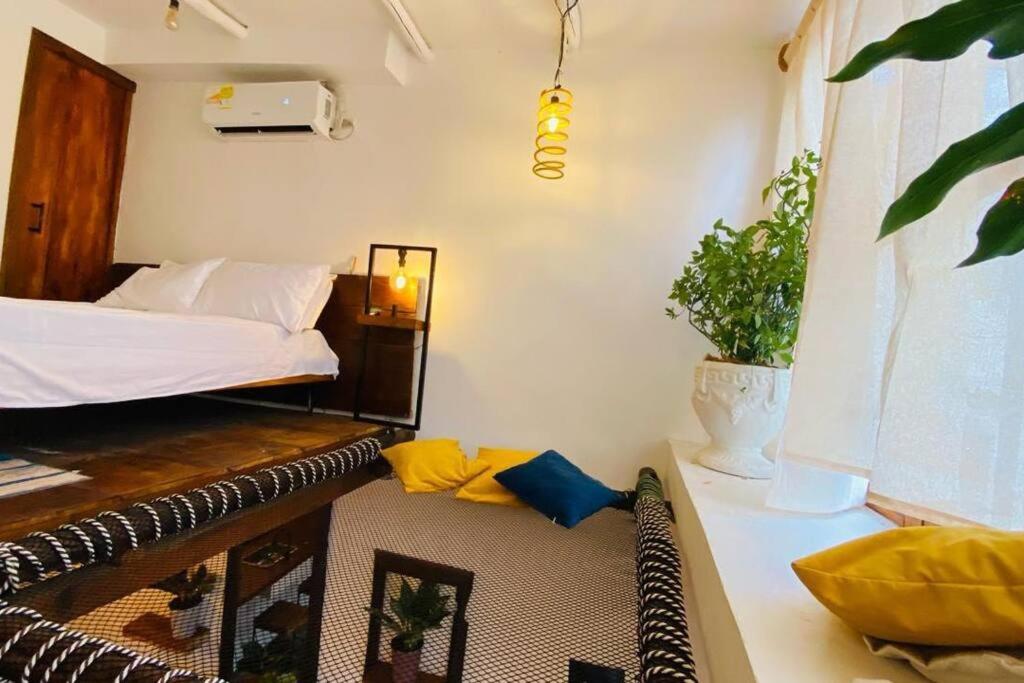Ένα ή περισσότερα κρεβάτια σε δωμάτιο στο Apartamento Moderno Pardo 1945