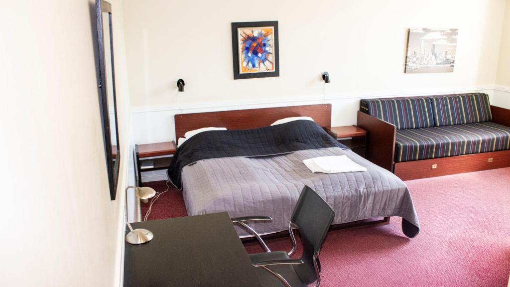 Postel nebo postele na pokoji v ubytování A Hotels Roskilde