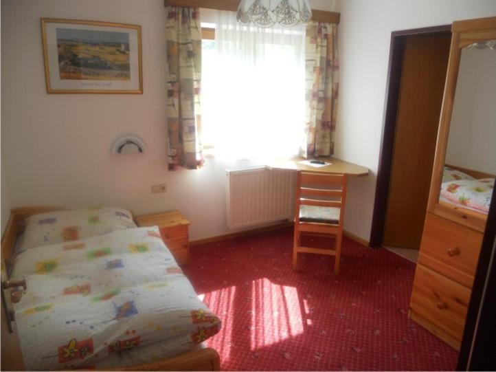 Postel nebo postele na pokoji v ubytování Haus Annemarie