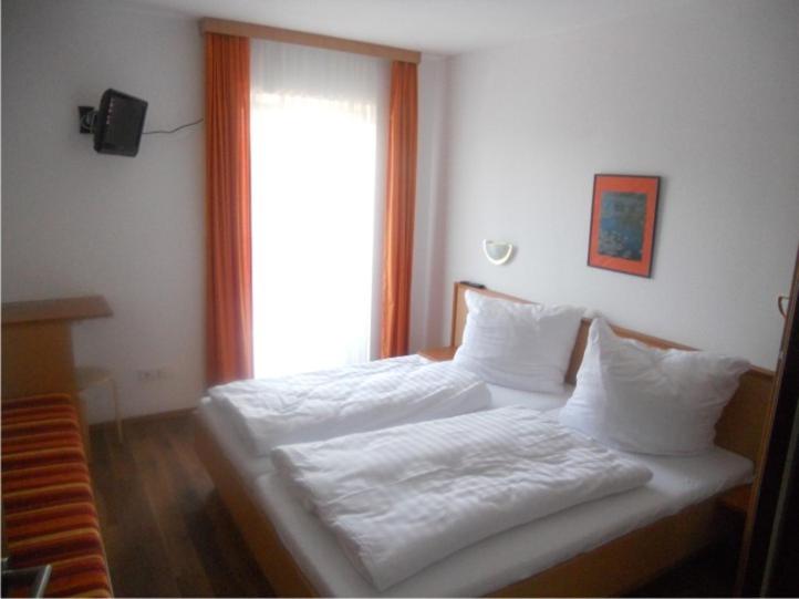 Postel nebo postele na pokoji v ubytování Haus Annemarie