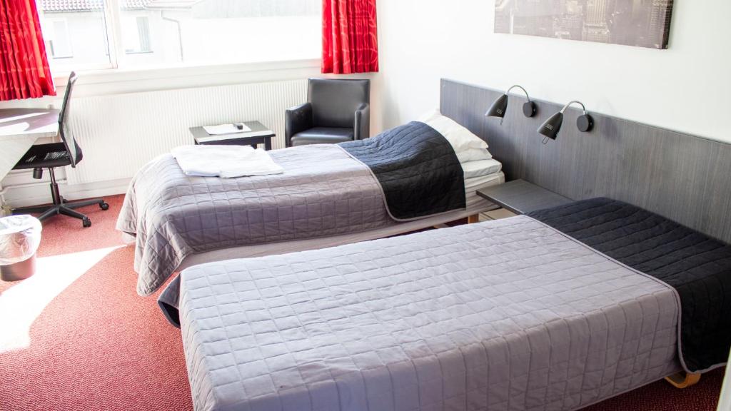 Postel nebo postele na pokoji v ubytování A Hotels Roskilde