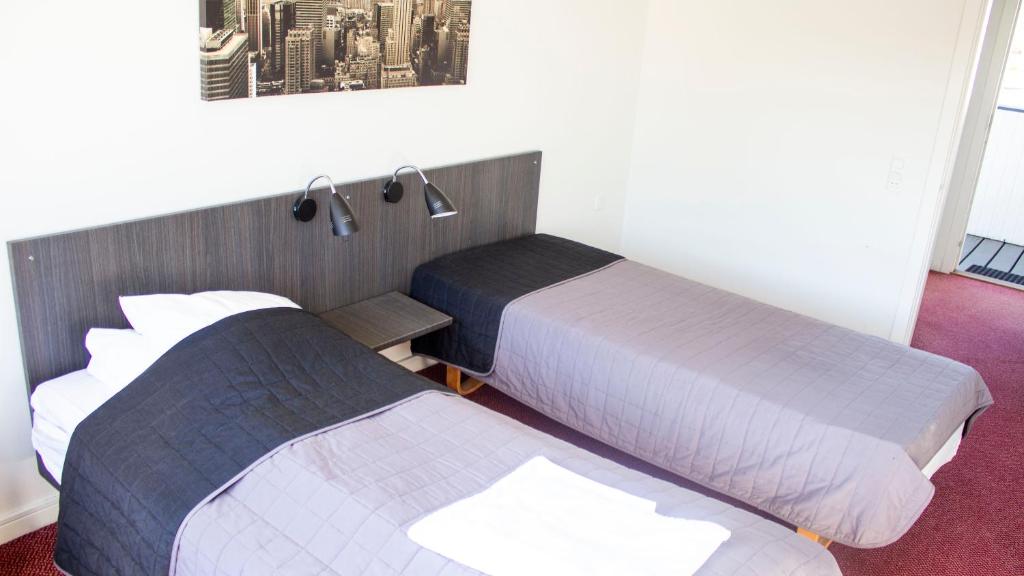 Postel nebo postele na pokoji v ubytování A Hotels Roskilde