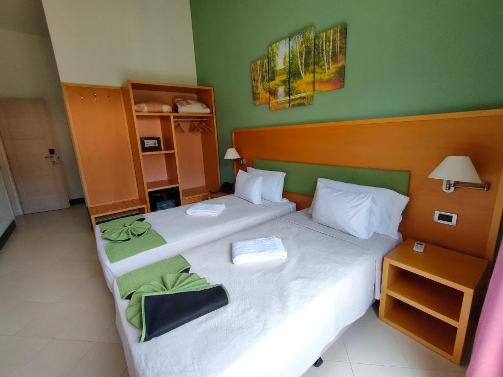 Postel nebo postele na pokoji v ubytování Hotel Belvedere Mindelo, Cabo Verde