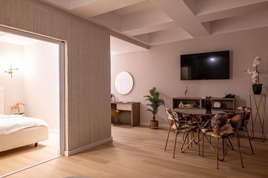 TV a/nebo společenská místnost v ubytování Hotel Ges