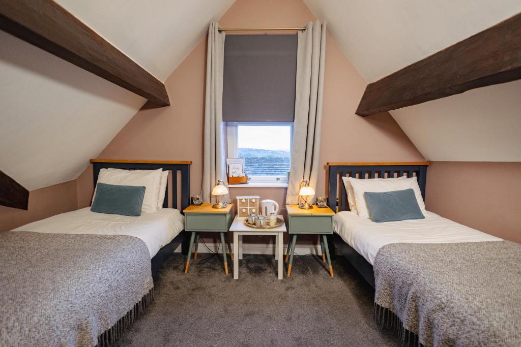 Säng eller sängar i ett rum på Weavers Guesthouse by Weavers of Haworth