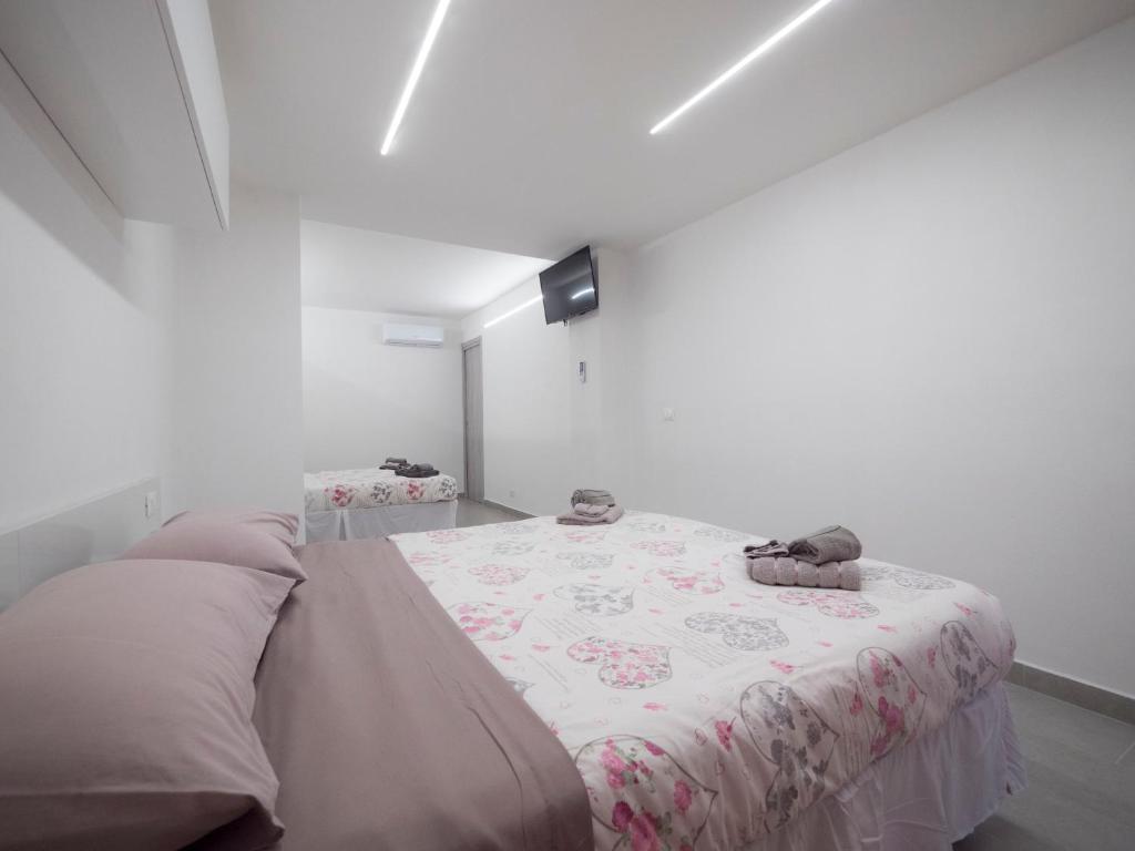 A bed or beds in a room at Villa Lisa casa vacanze