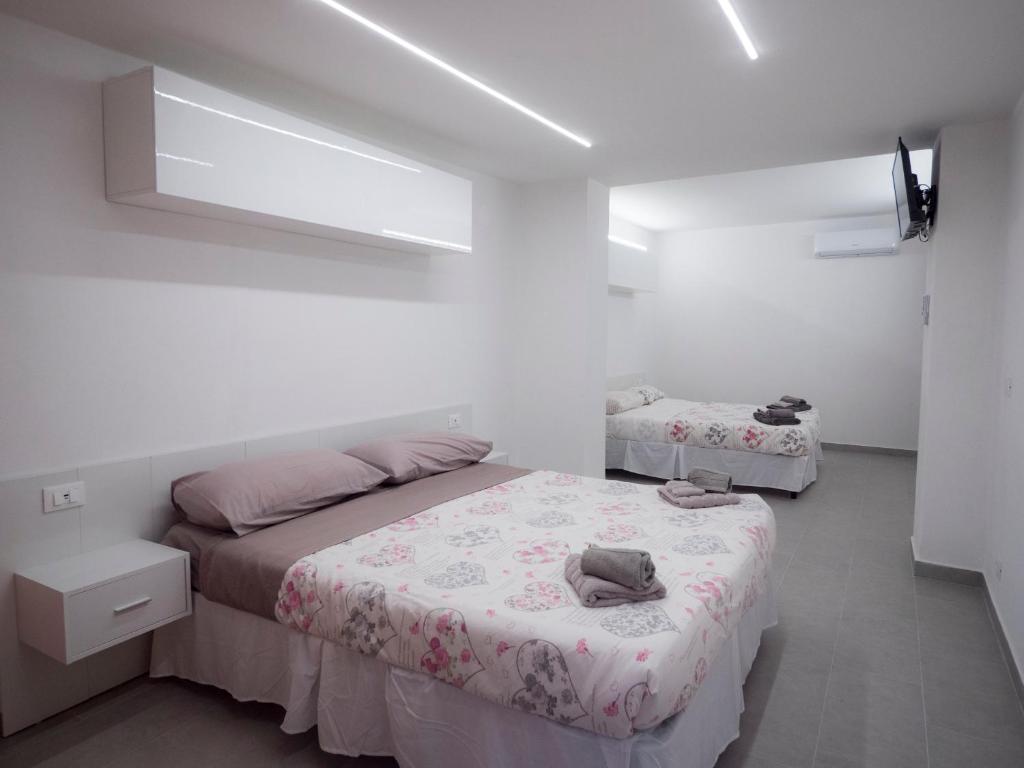 A bed or beds in a room at Villa Lisa casa vacanze