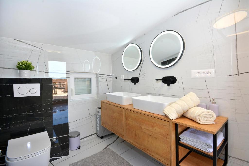 Kúpeľňa v ubytovaní Apartments Radeljić