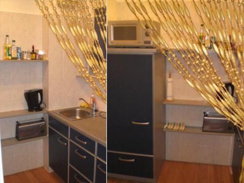 two pictures of a kitchen with a sink and a microwave at Apartment Nannerl in Salzburg