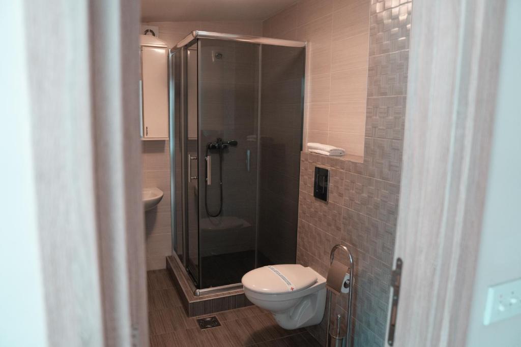 Koupelna v ubytování Hotel Topcider