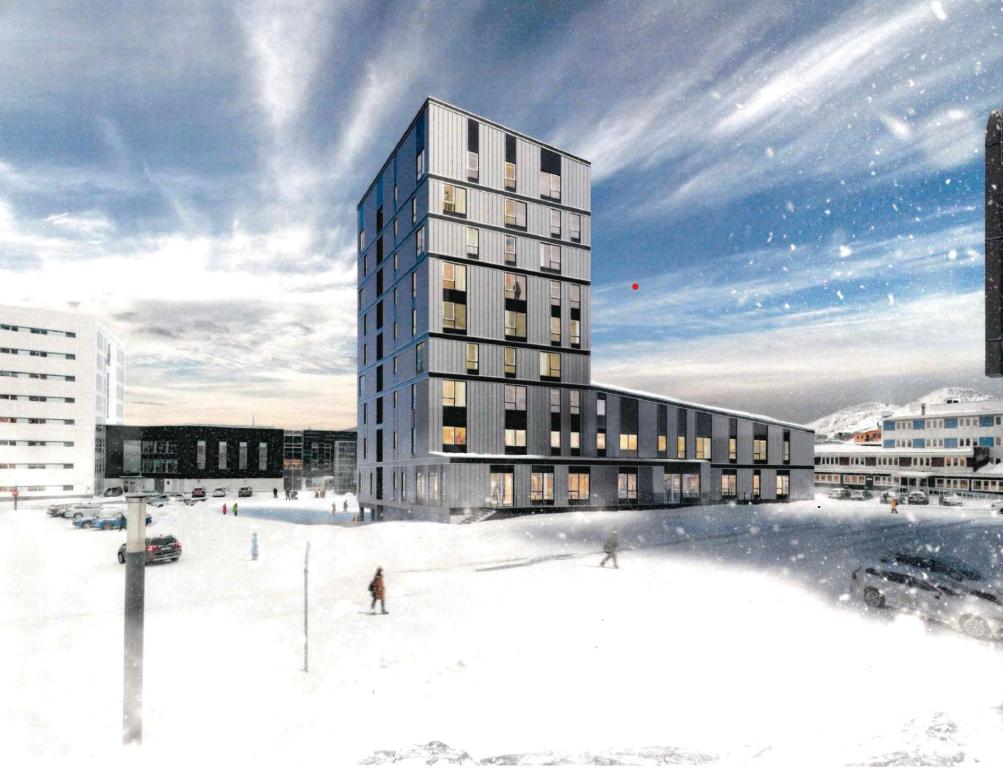 una representación de un edificio alto en la nieve en Hotel Aurora Apartments, en Nuuk