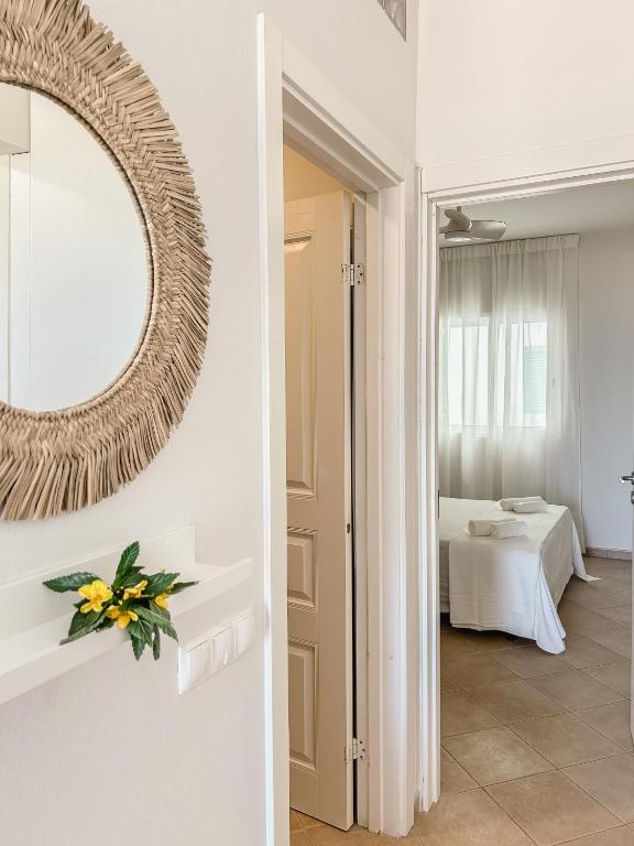 Postel nebo postele na pokoji v ubytování Papaya Apartments Boa Vista