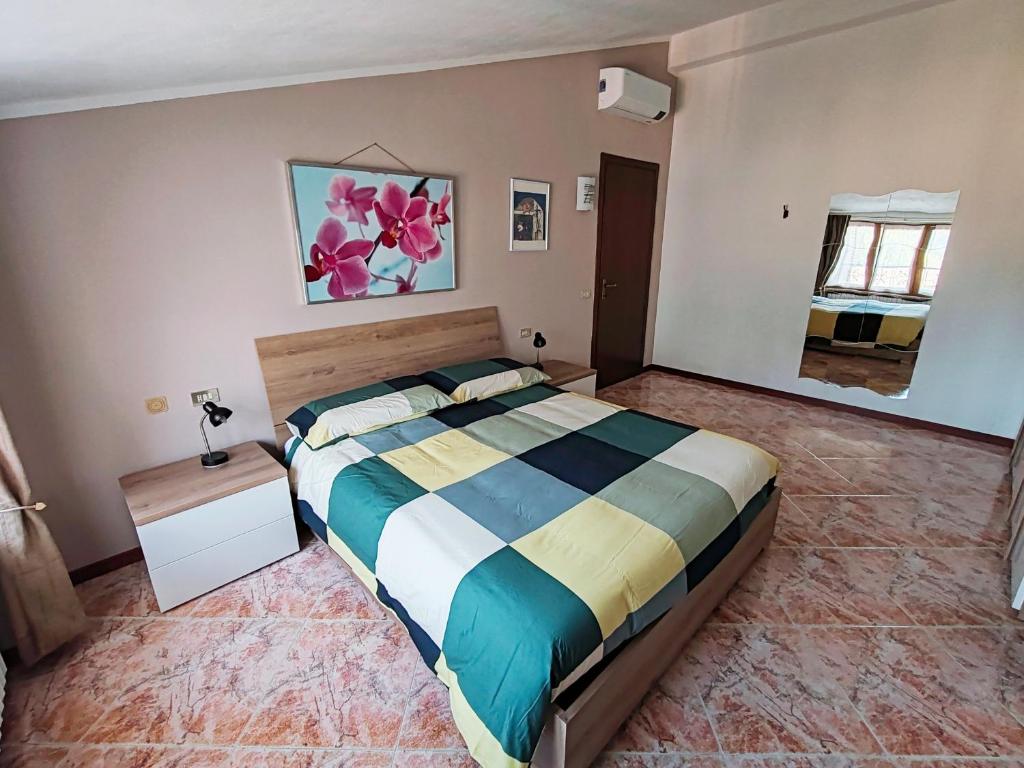 Postel nebo postele na pokoji v ubytování Silla House - A due passi dal lago