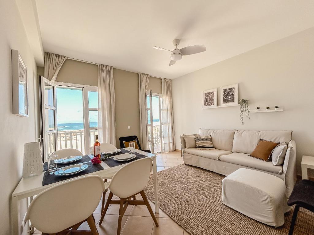 Postel nebo postele na pokoji v ubytování Papaya Apartments Boa Vista