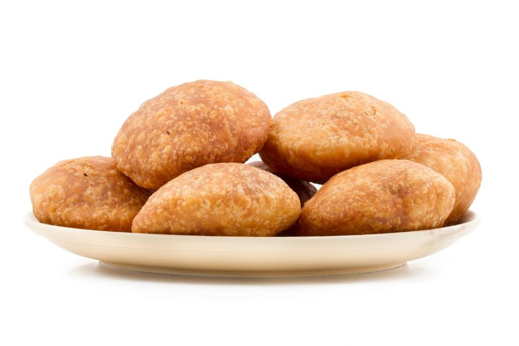 a plate of no bake peanut butter energy balls at Collection O Tip Top in Jaipur