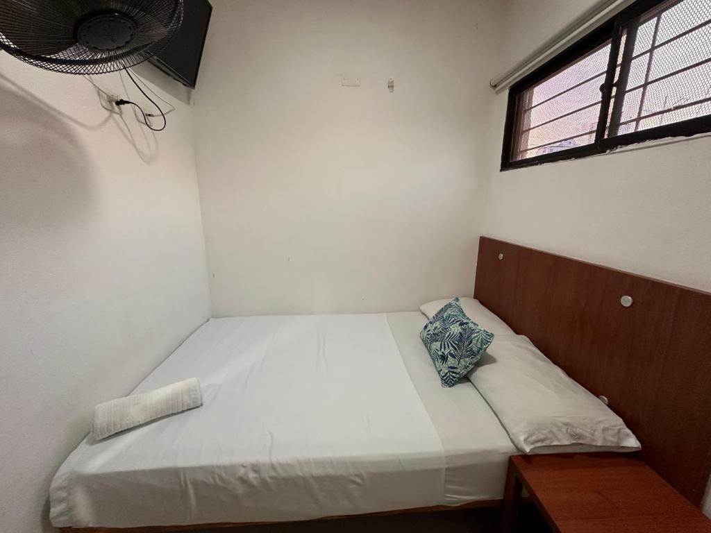 Łóżko lub łóżka w pokoju w obiekcie Hotel Tamaca Real